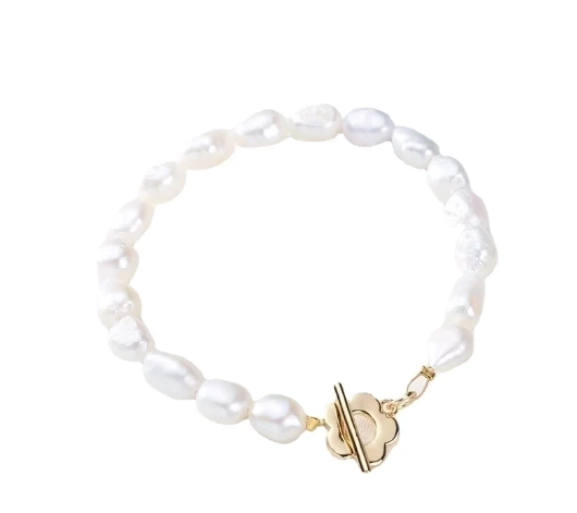 Pulsera única de perla barroca con cierre de flor cruzado en oro 14K
